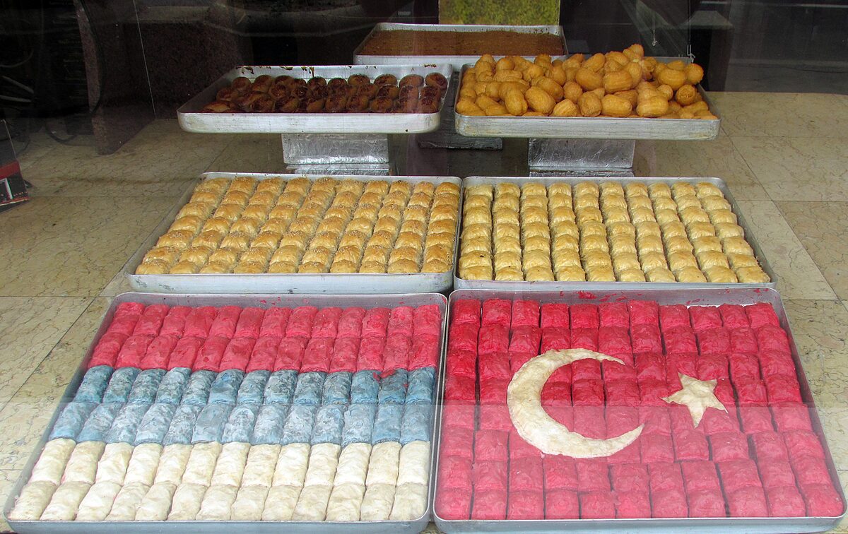 Trays of baklava in a Belgrade pastry shop window, two of them decorated with the Serbian and Turkish flags