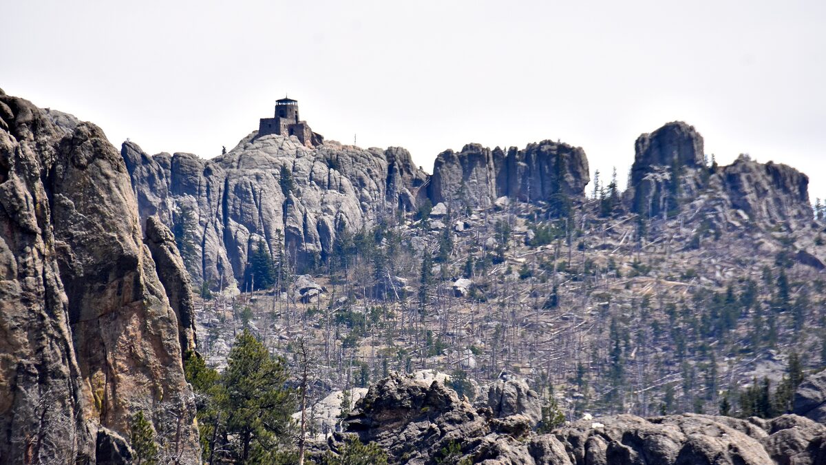 Granite crags of Black Elk Peak with the stone fire tower on the summit