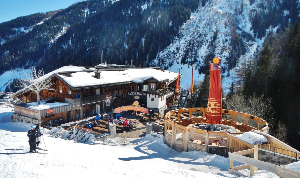 The Mooserwirt mountain hut in St. Anton with its snowy terrace and bar