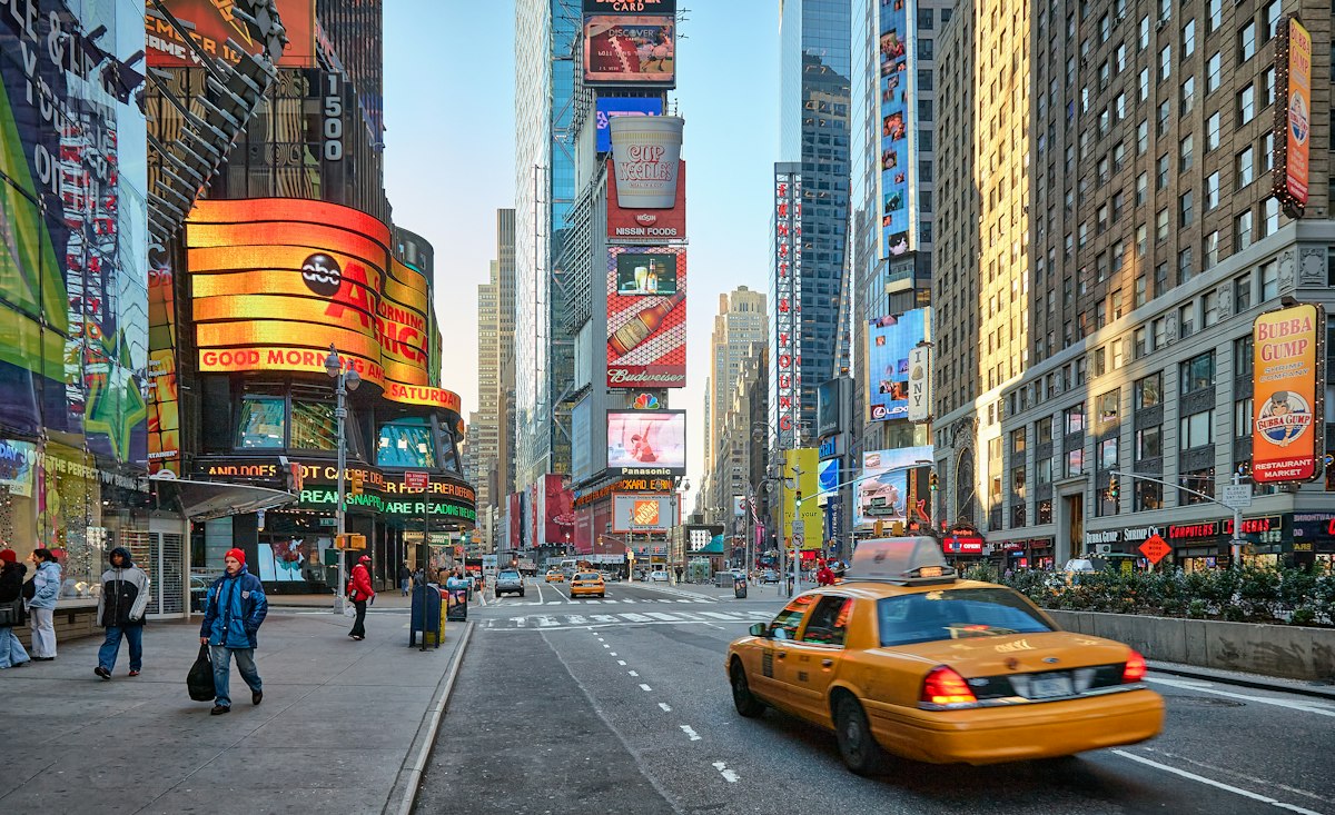 Yellow cabs and traffic in Times Square, New York, where the Lincoln Highway began