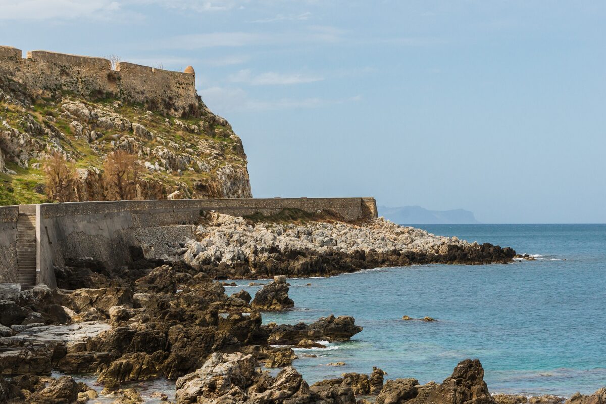 The walls of Rethymno's Venetian Fortezza on the rocky headland above the sea