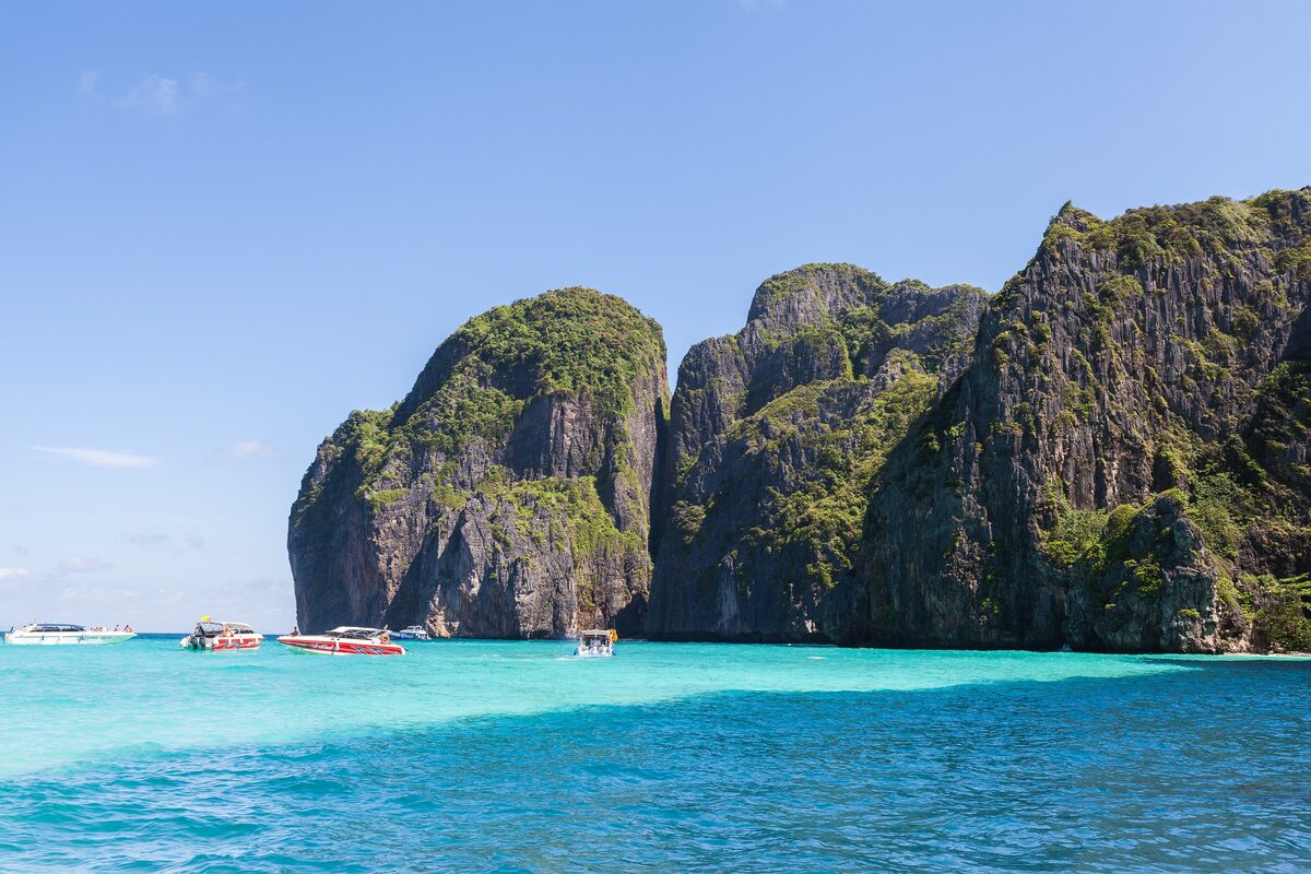 Maya Bay on Phi Phi Leh, turquoise water below tall limestone cliffs