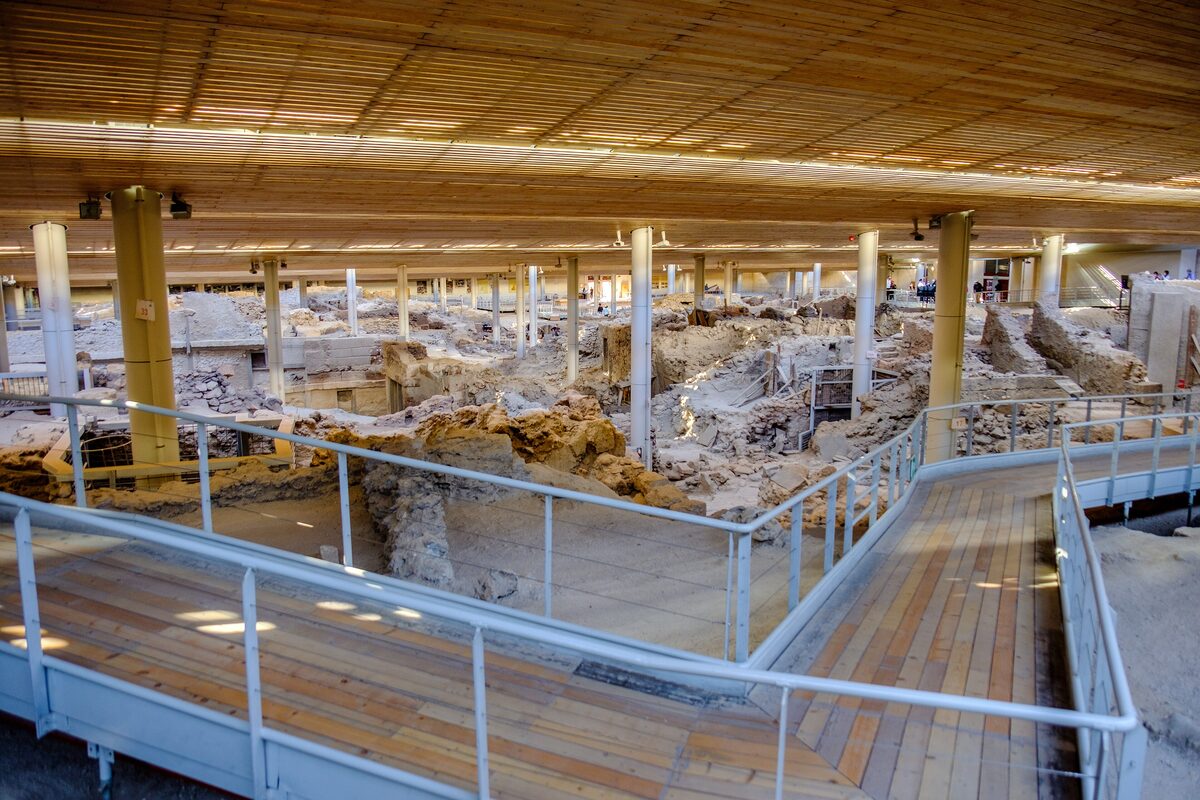 Raised wooden walkways under the roof of the Akrotiri excavation on Santorini, above the Bronze Age ruins