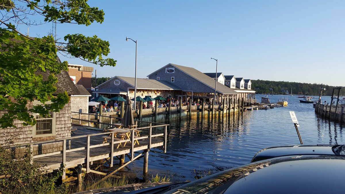 Wooden lobster pier and restaurant buildings on the Southwest Harbor waterfront