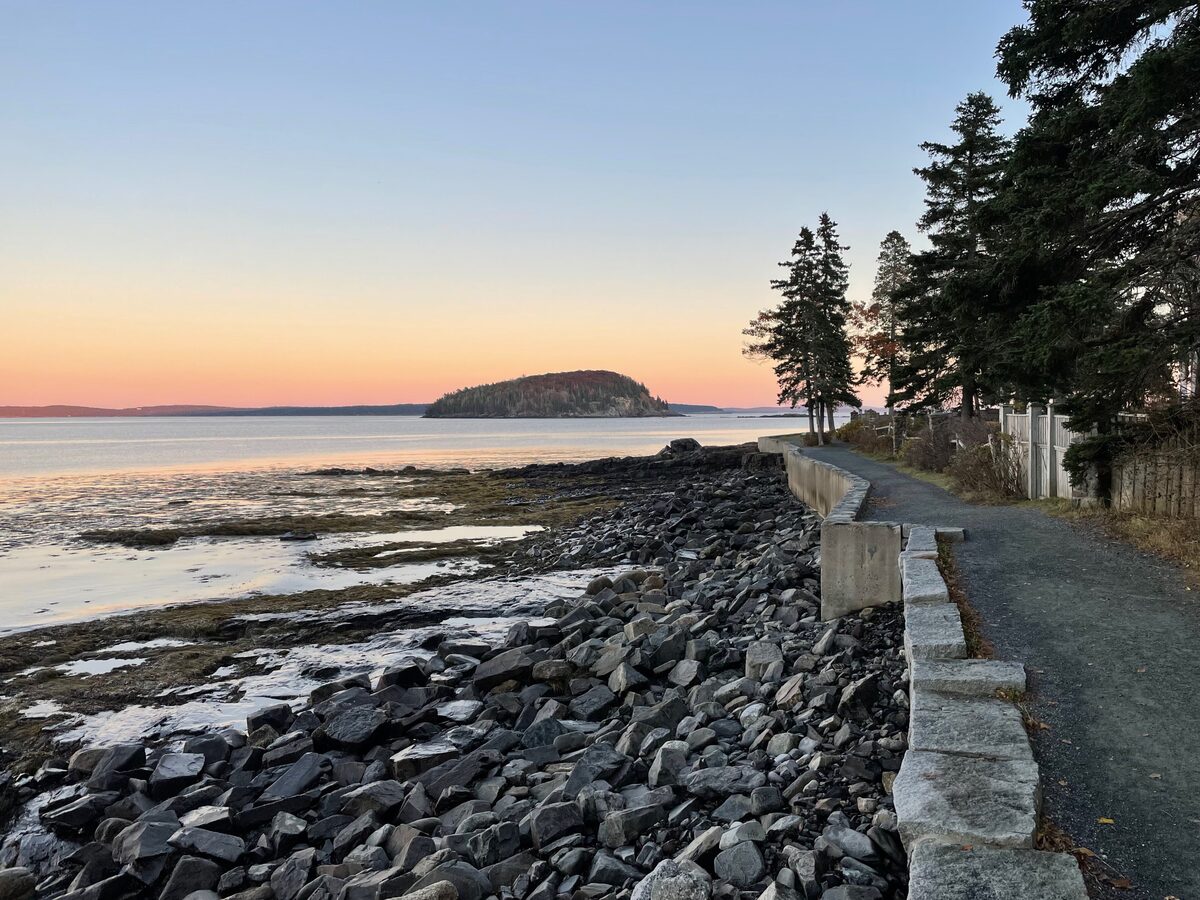 The Shore Path along Frenchman Bay at sunset, with Bar Island offshore