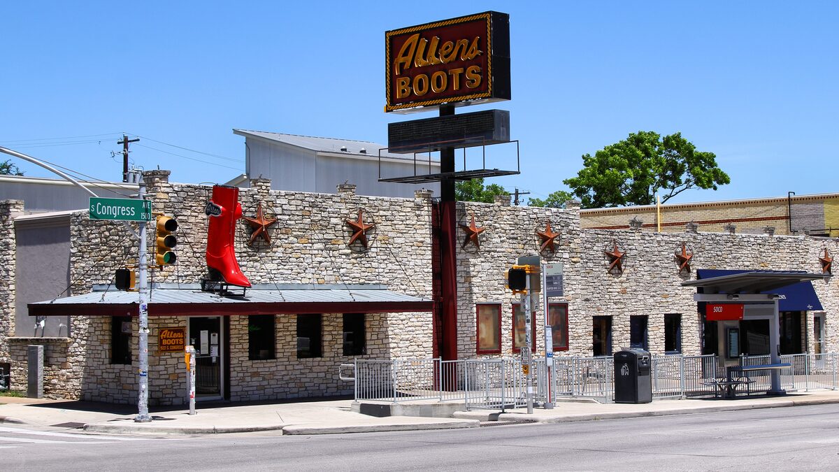 Allens Boots on South Congress Avenue, a stone shop front with a giant red boot on its sign