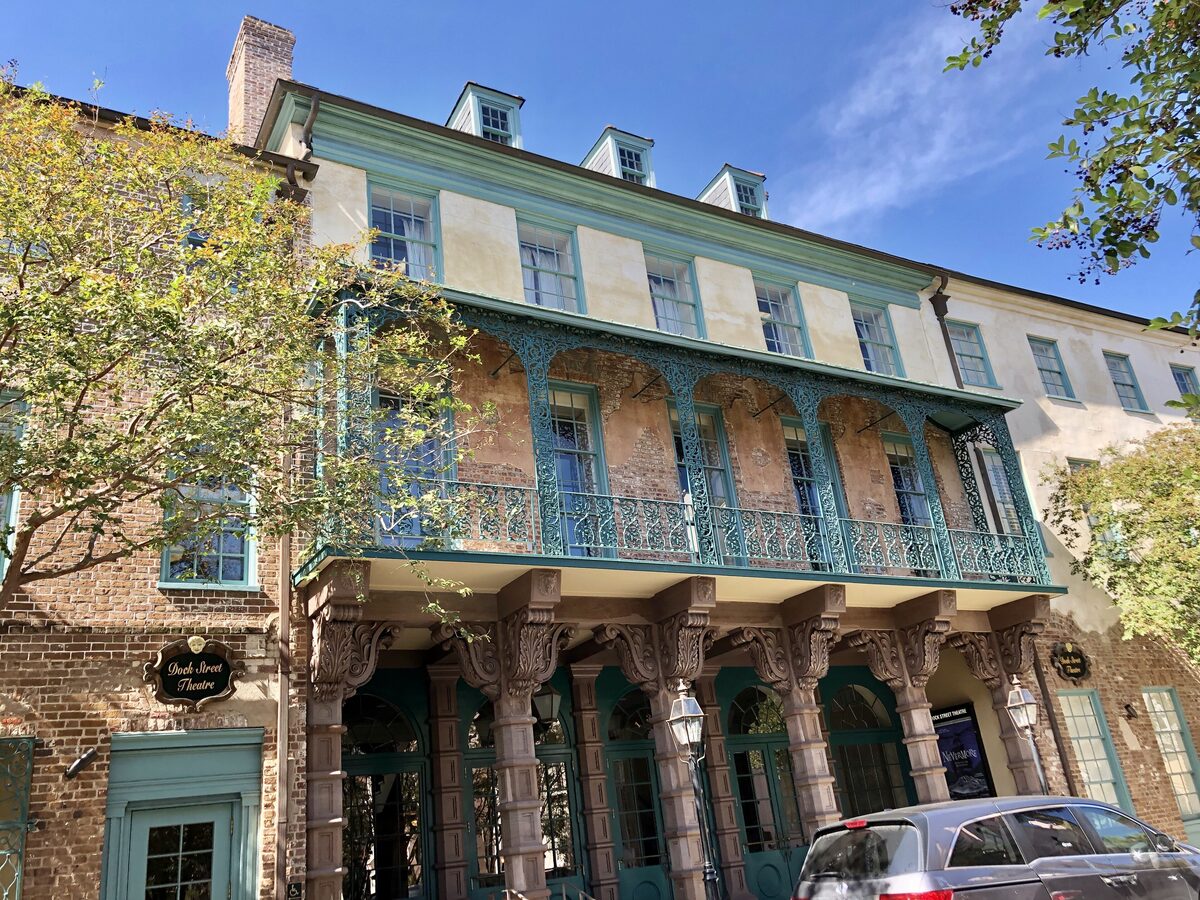 Dock Street Theatre facade with its green iron balcony