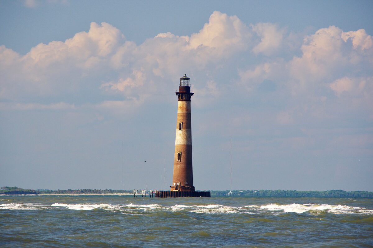 Morris Island Lighthouse standing in the surf off Folly Beach
