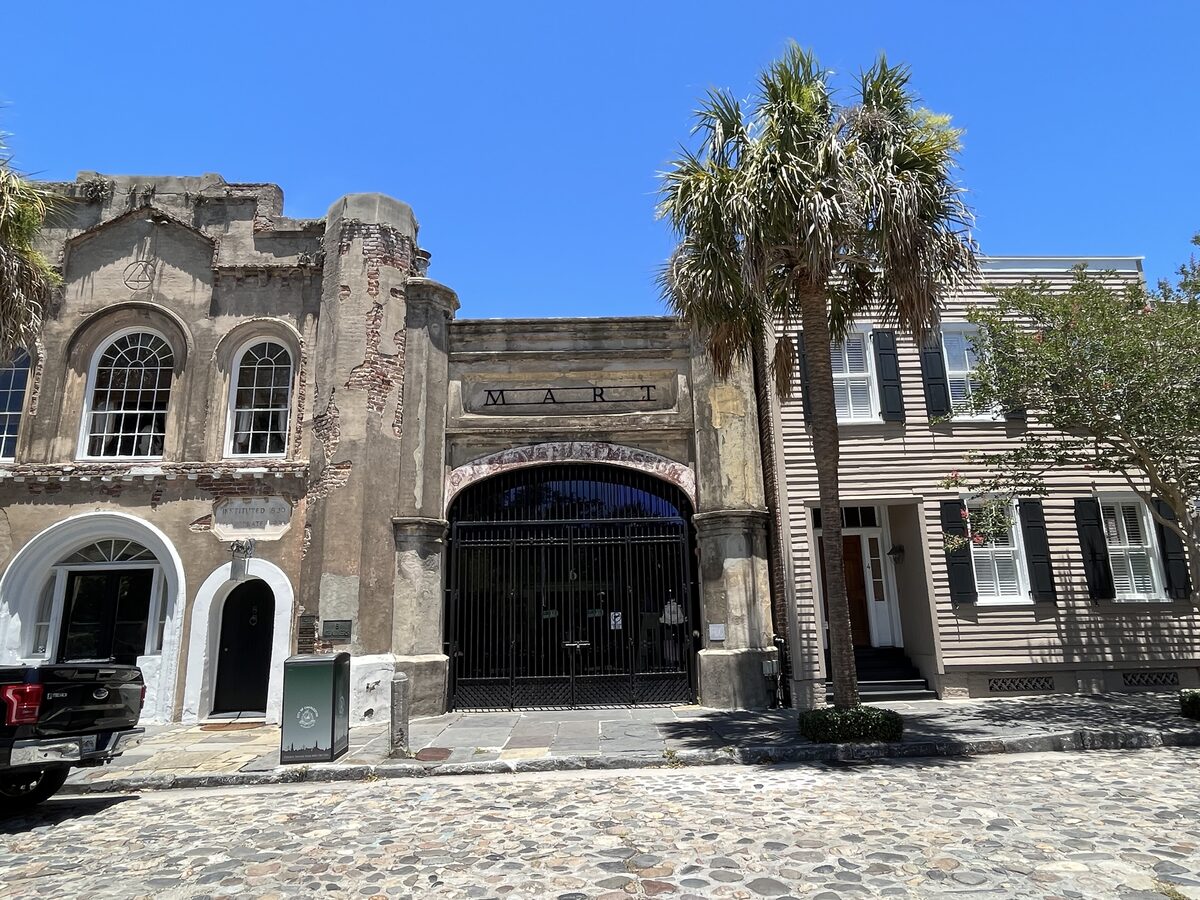 Weathered brick facade and Mart gateway on Chalmers Street