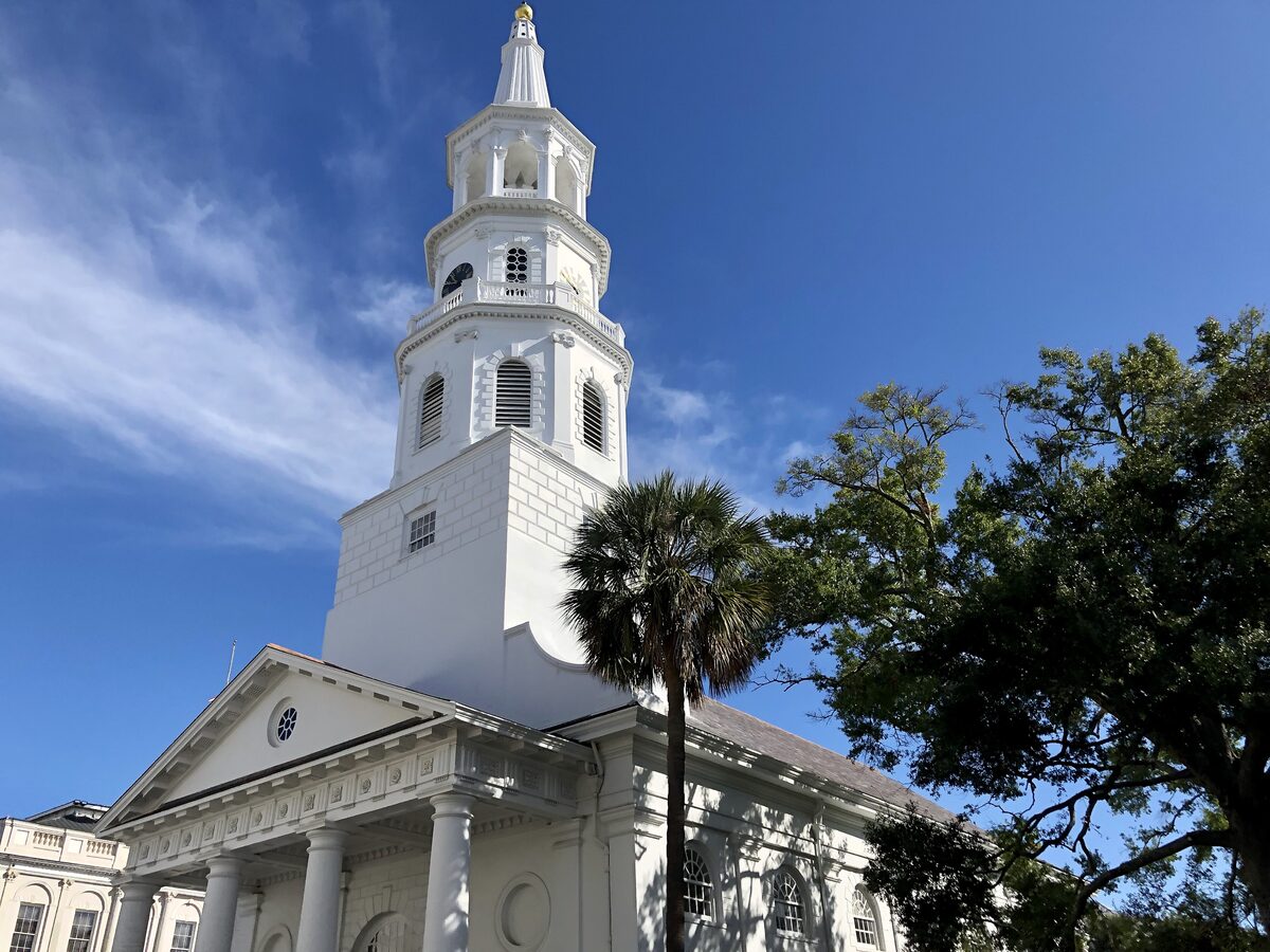 White steeple and columned portico of St. Michael's Church