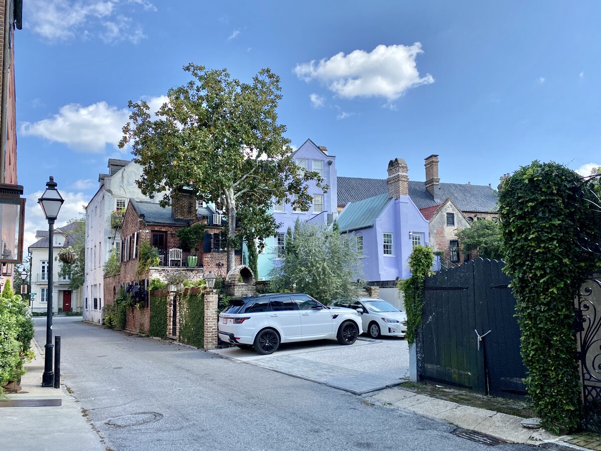 Pastel house with chimneys on a quiet South of Broad street