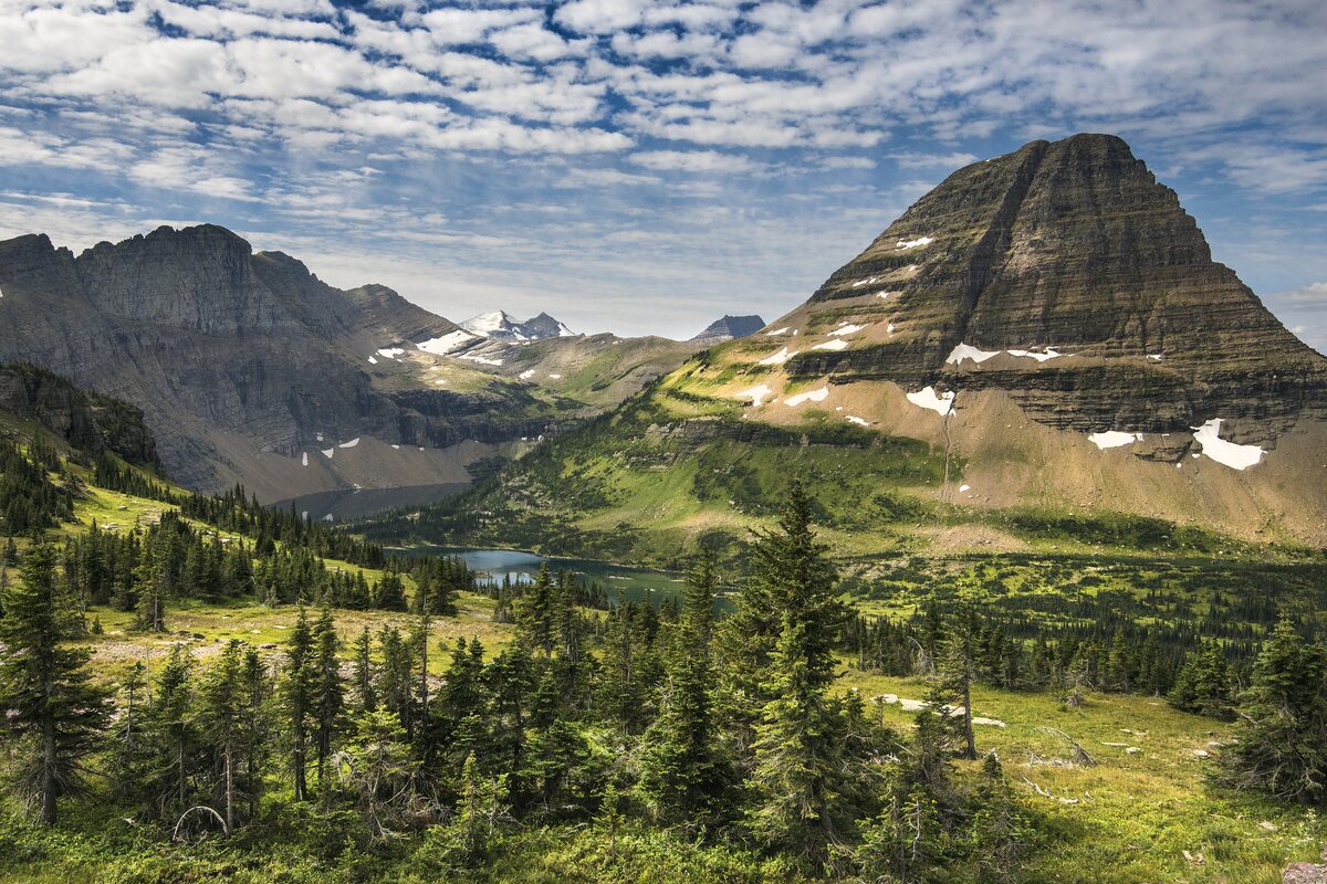 Hidden Lake below a striped mountain, seen from the overlook