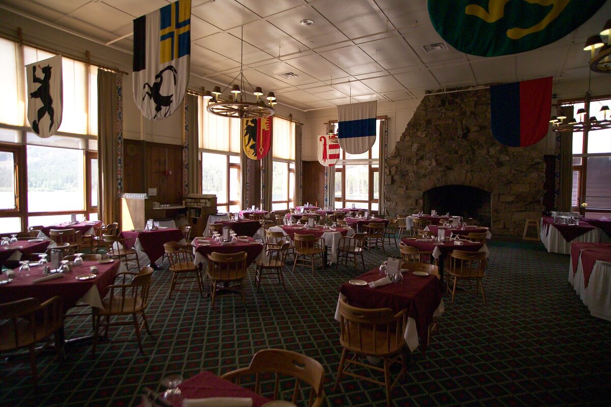 Dining room at Many Glacier Hotel with Swiss flags