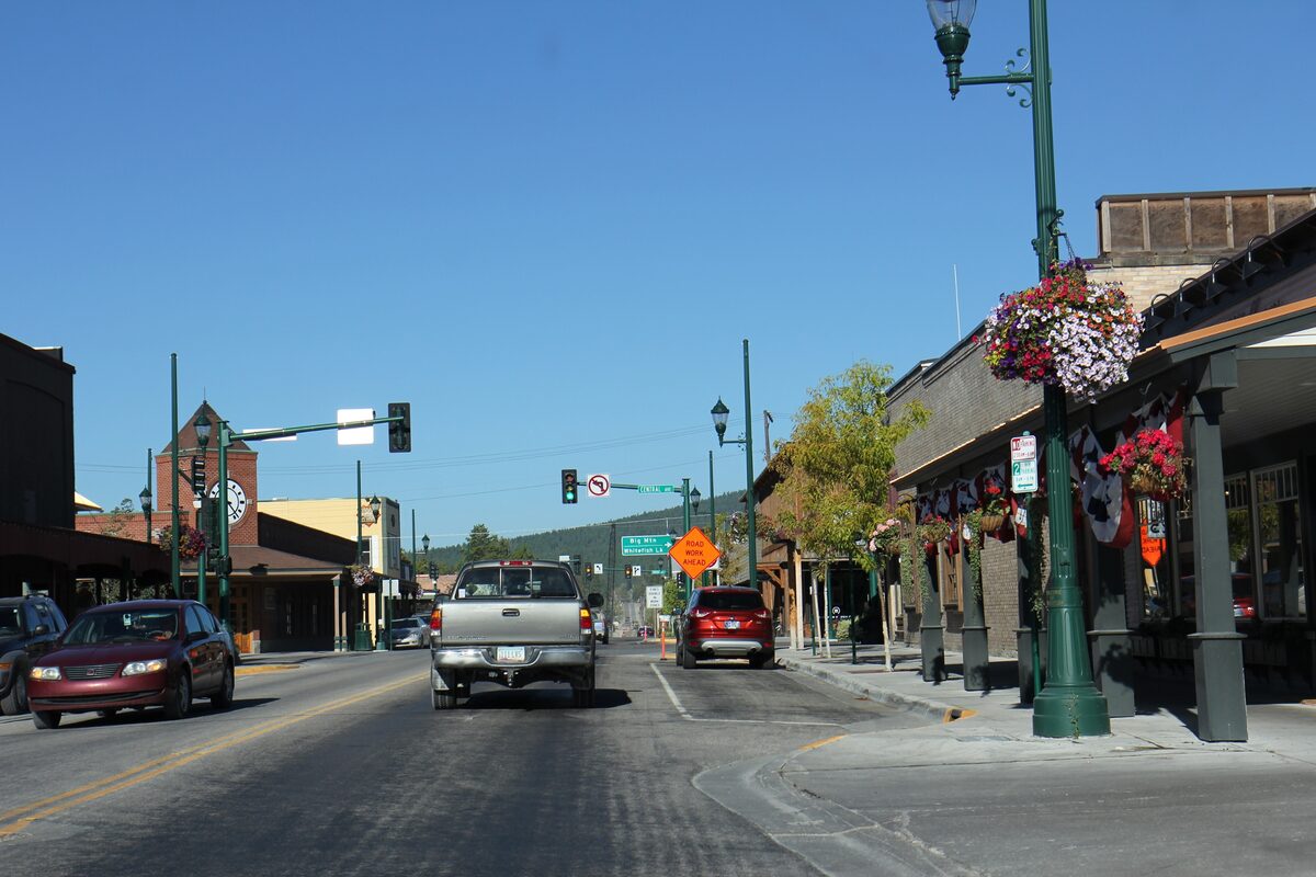 Main street of downtown Whitefish with hanging flower baskets