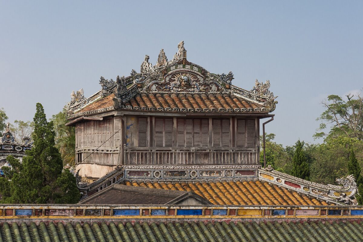 A two-story wooden pavilion with a carved and gilded roof ridge inside the Forbidden Purple City