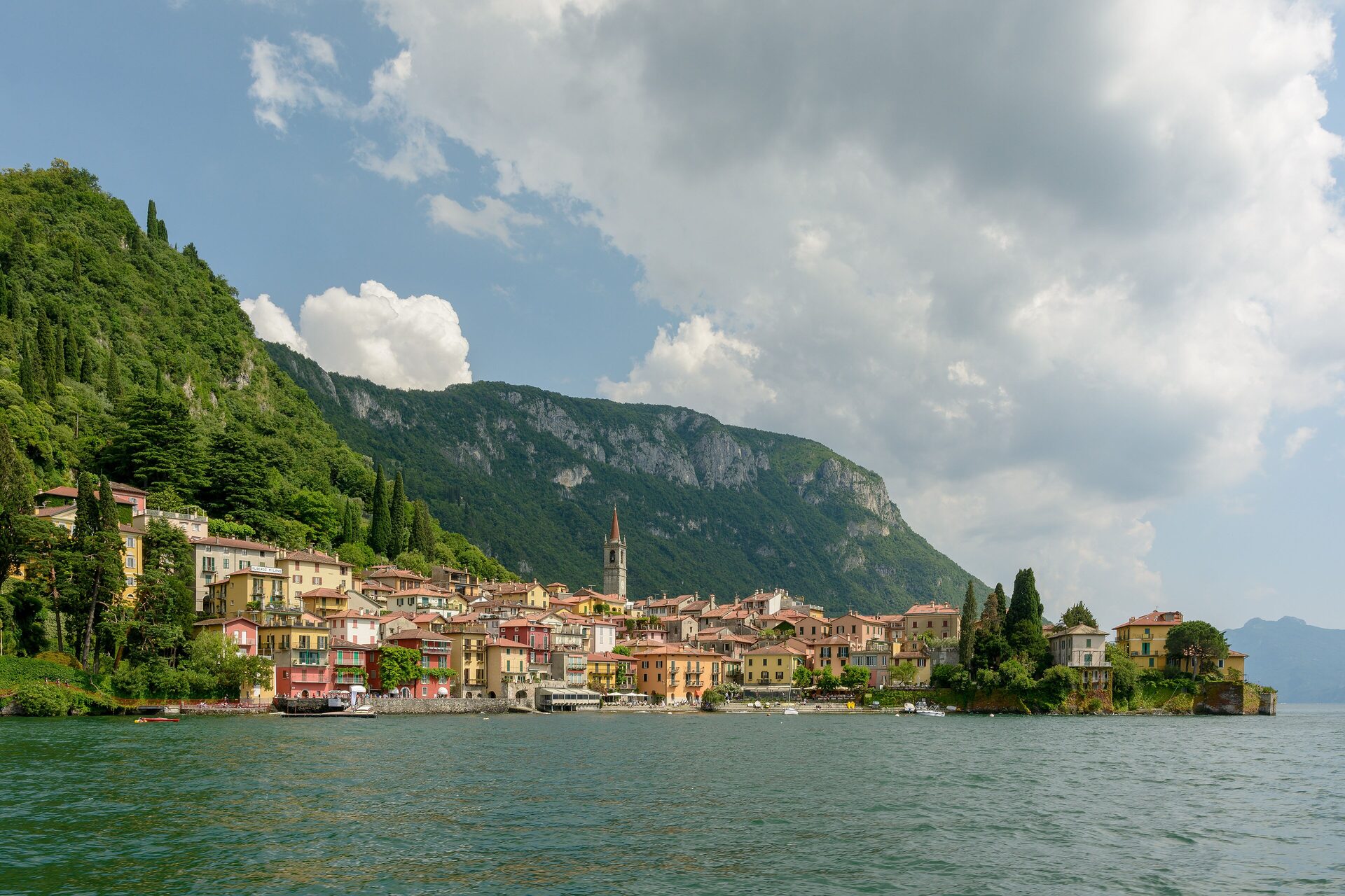 Lake Como with the village of Varenna on the shore and mountains rising behind the water