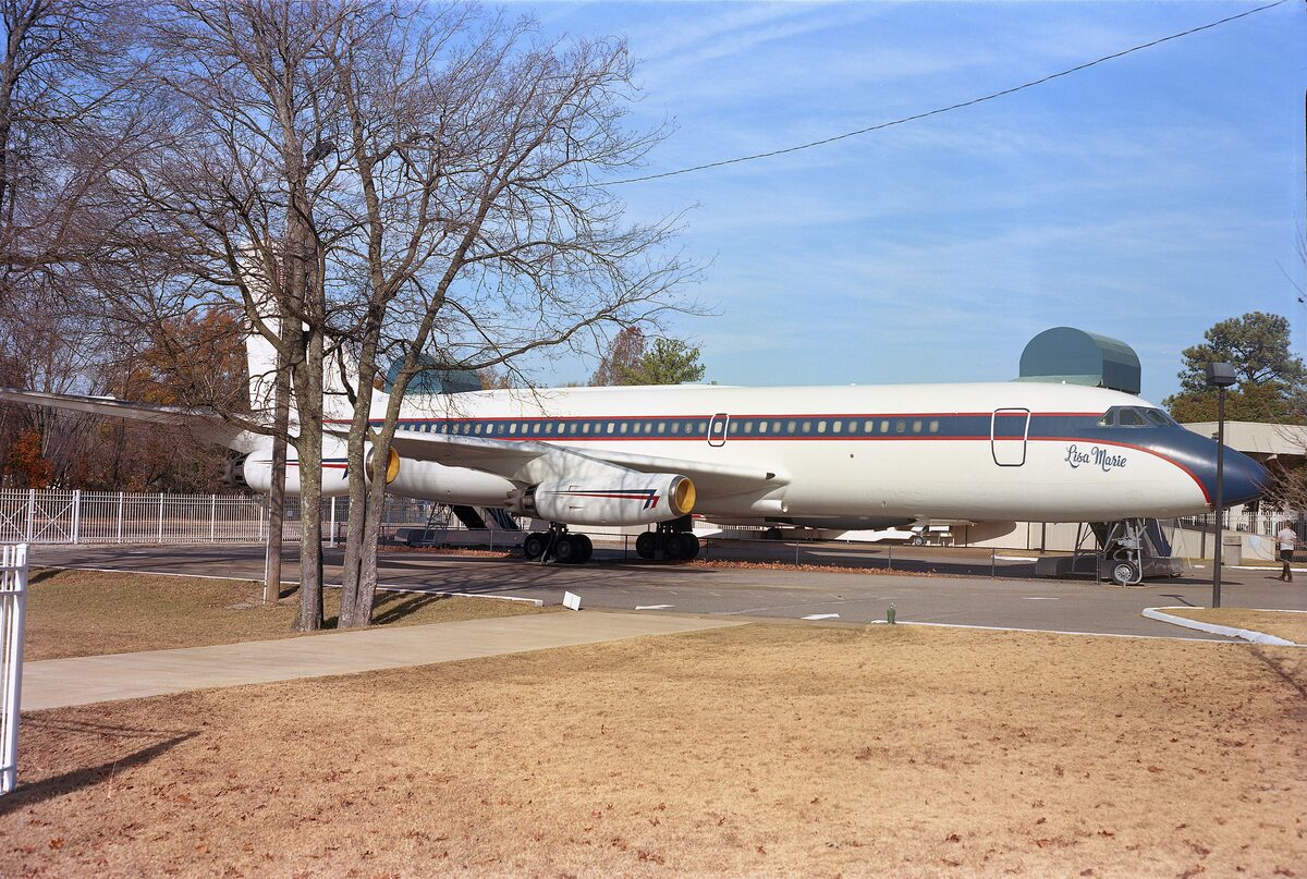 Elvis's Convair jet Lisa Marie parked behind a fence at Graceland