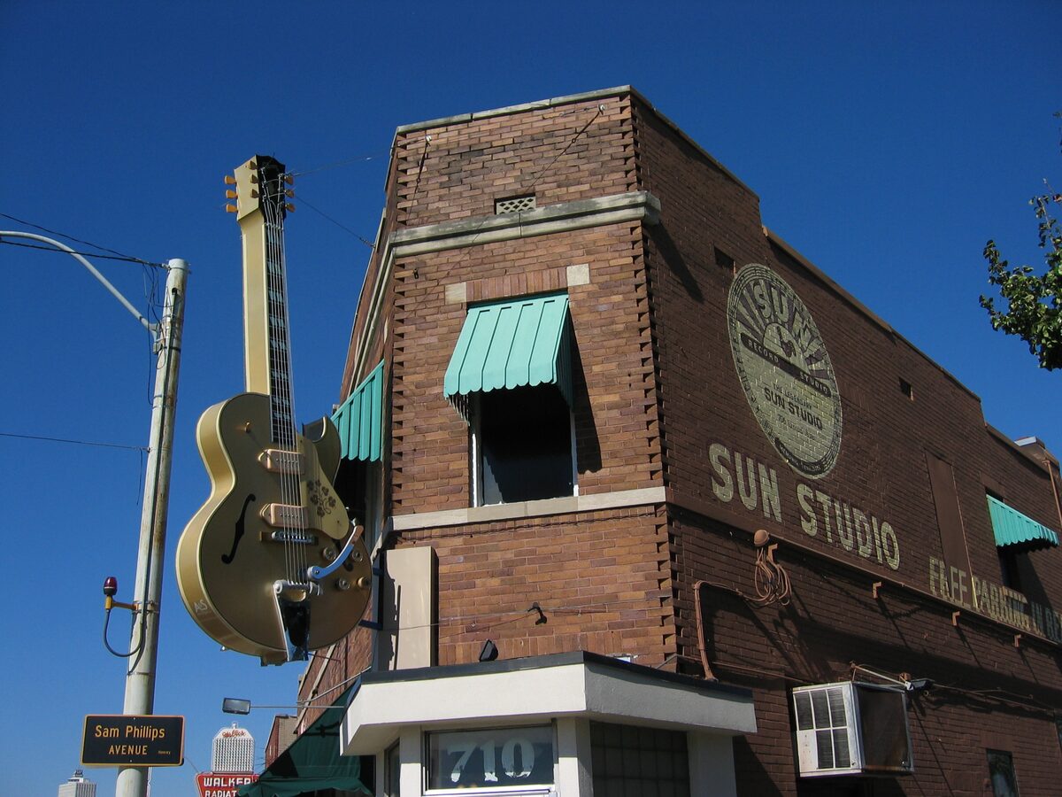 Sun Studio's brick corner with its painted sign and giant guitar
