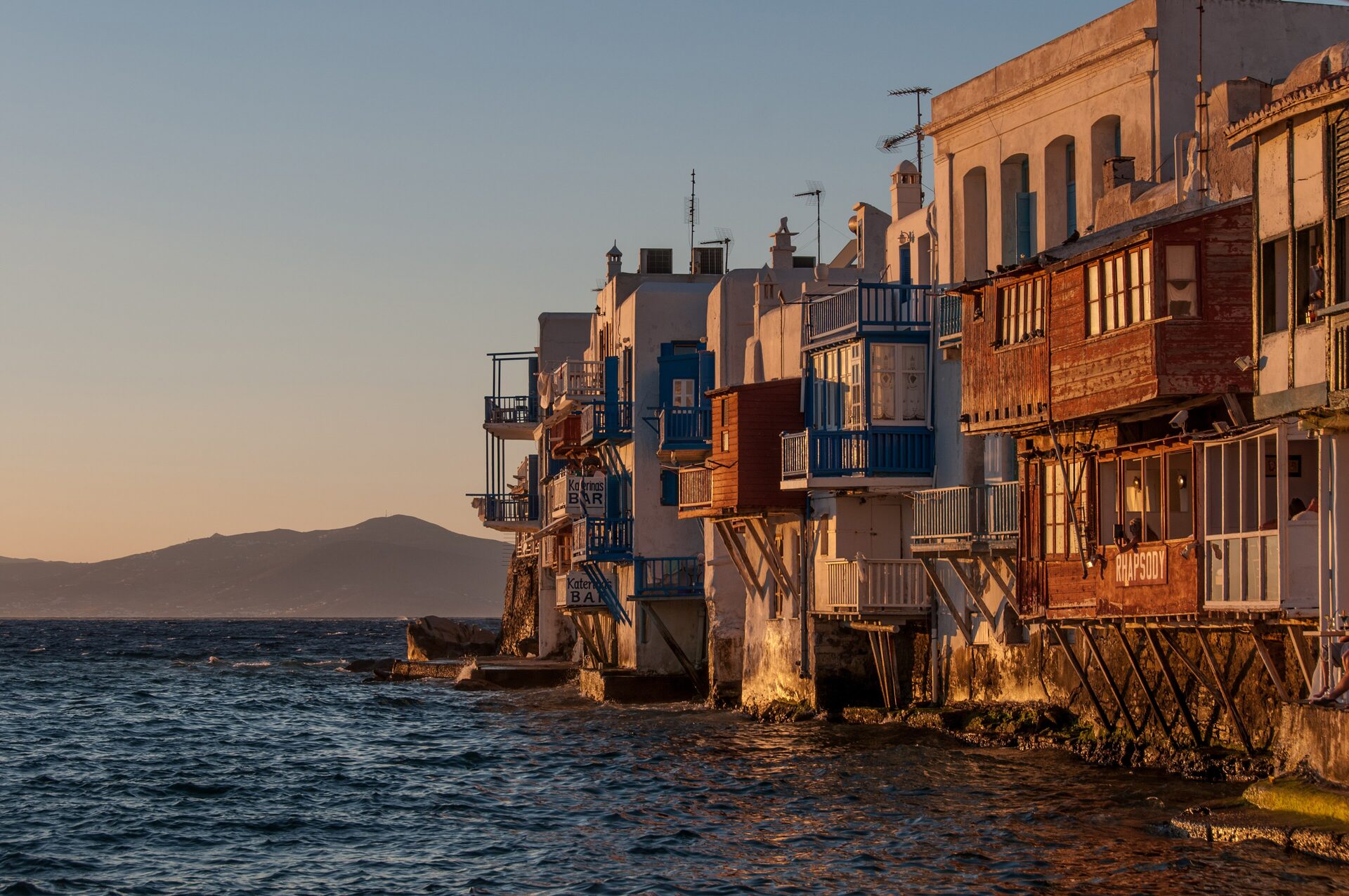 Little Venice at sunset, its waterfront houses on stilts above the sea