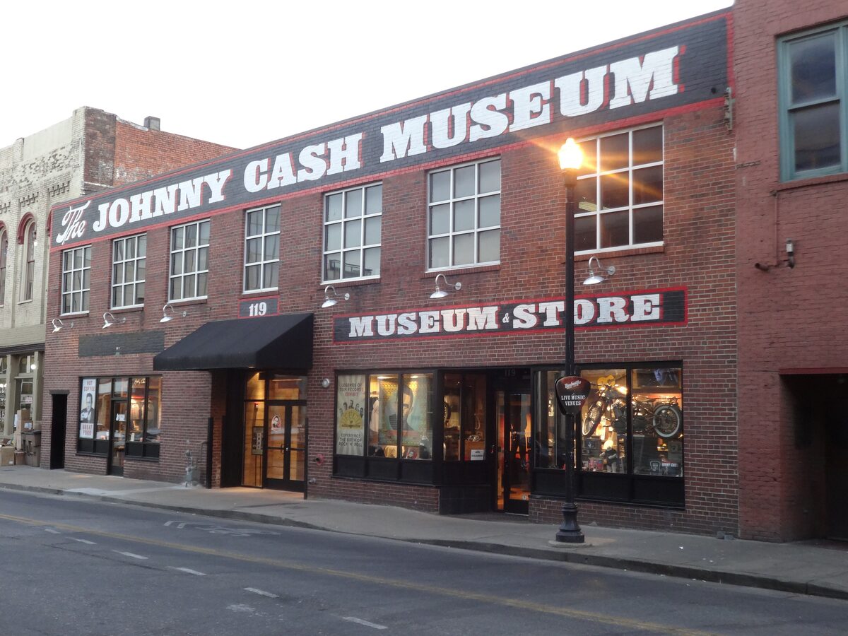 The brick front of the Johnny Cash Museum with its big sign and the museum store entrance