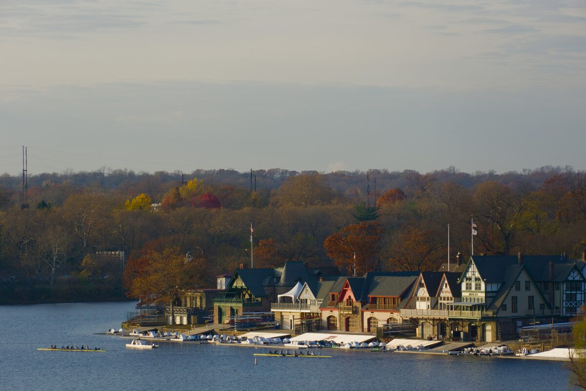 The row of Victorian boathouses along the Schuylkill River in autumn