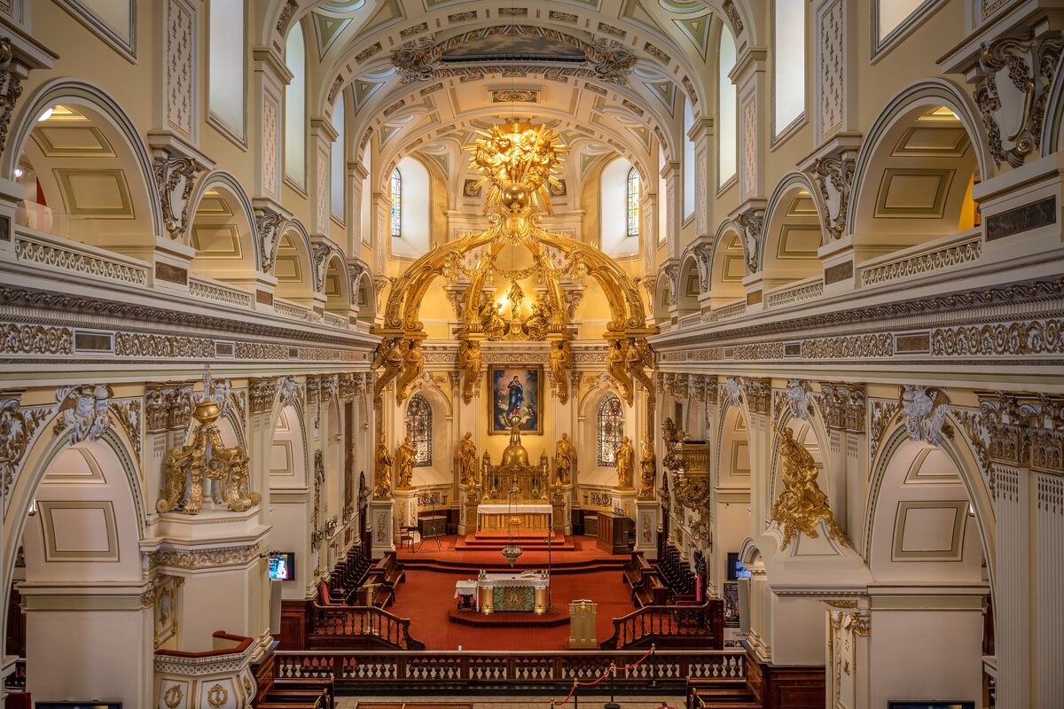 The gilded nave and baldachin of Notre-Dame de Québec Basilica-Cathedral seen from the gallery