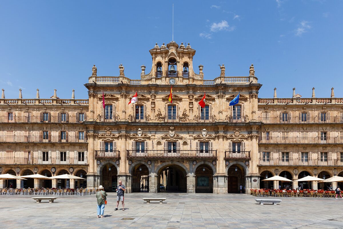 The town hall facade on the Plaza Mayor, with tiered balconies and arcades below