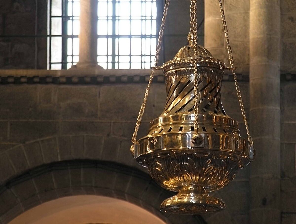 The Botafumeiro, the silver and brass censer, hanging from its chains in the cathedral