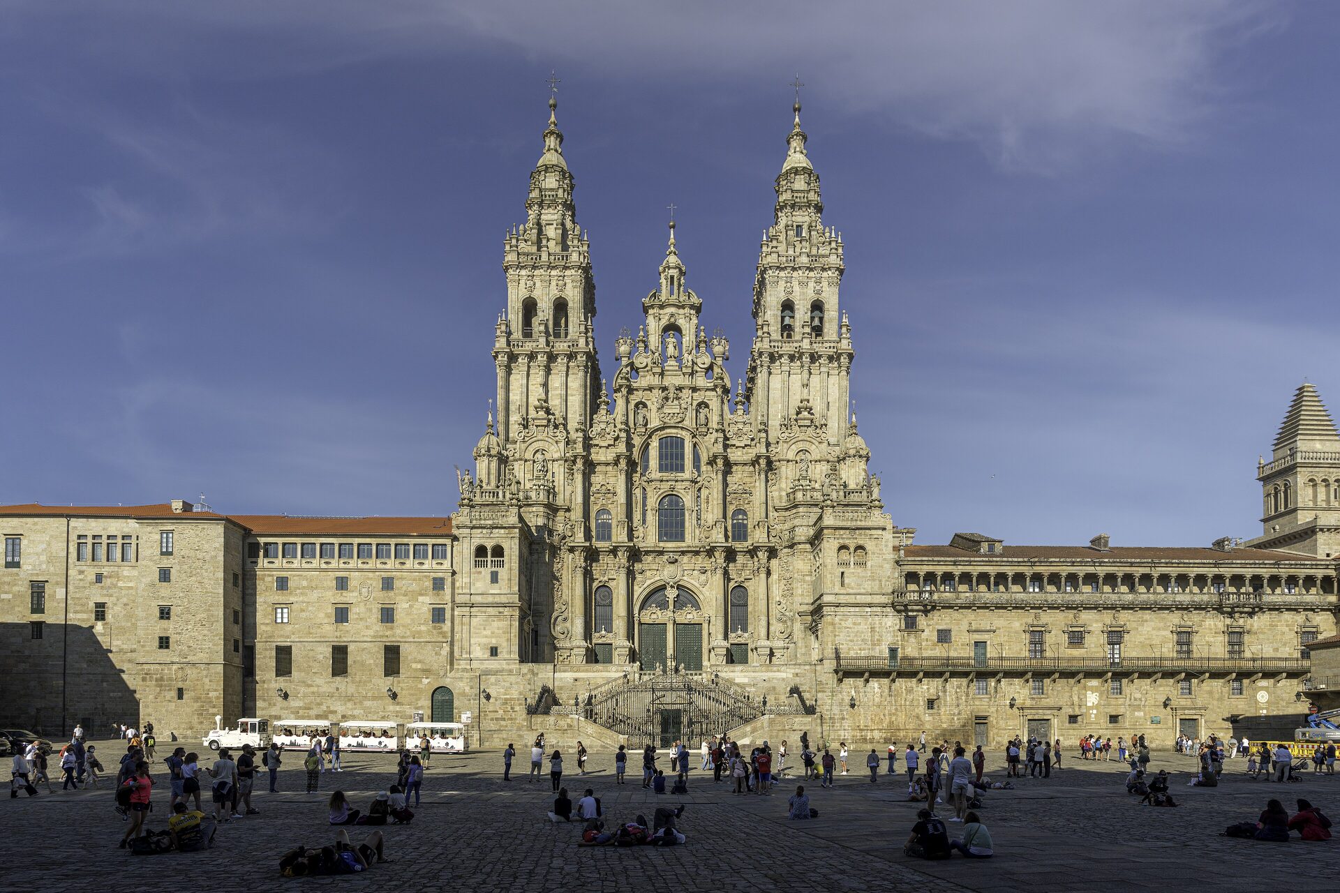 The Baroque Obradoiro facade of Santiago de Compostela Cathedral with its two towers, seen across the square