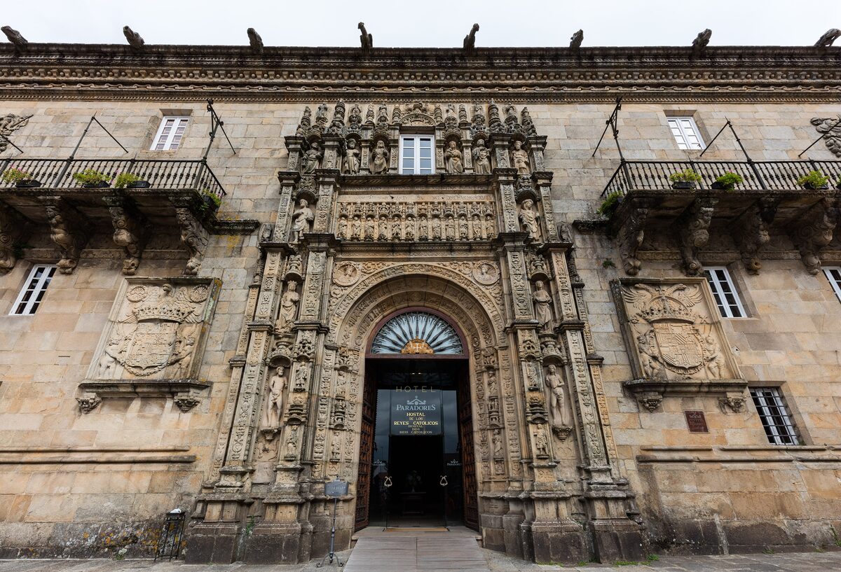 The Plateresque doorway and carved stone facade of the Hostal dos Reis Católicos