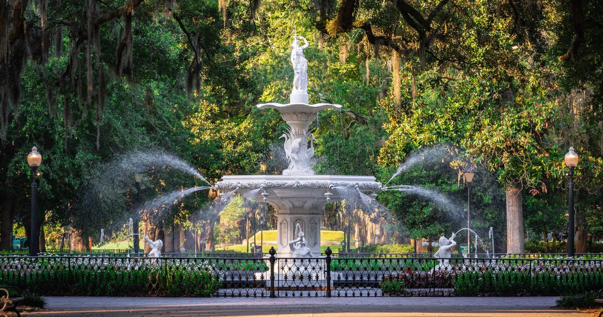 Forsyth Park fountain framed by live oaks and Spanish moss