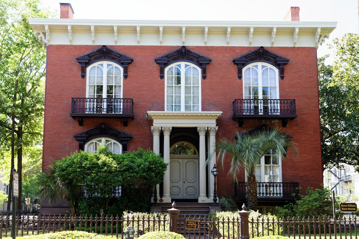 Mercer-Williams House, a red brick mansion with ironwork balconies