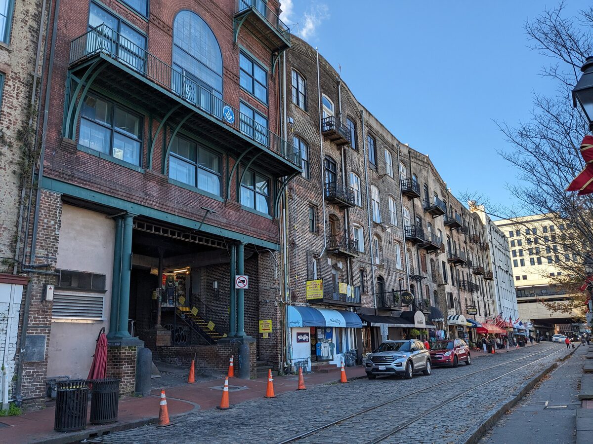 Brick cotton warehouses and cobbles along River Street