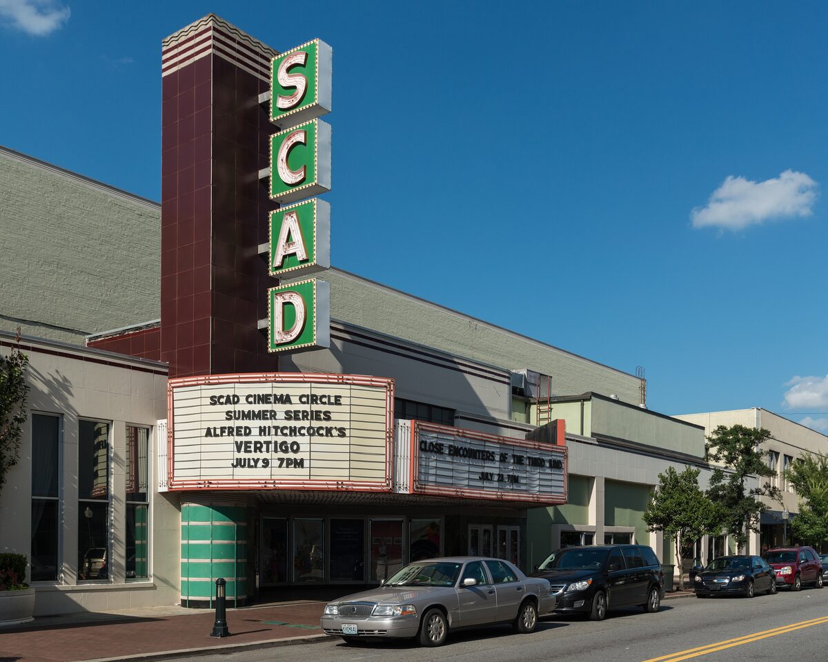 SCAD's Trustees Theater with its tall vertical sign on Broughton Street
