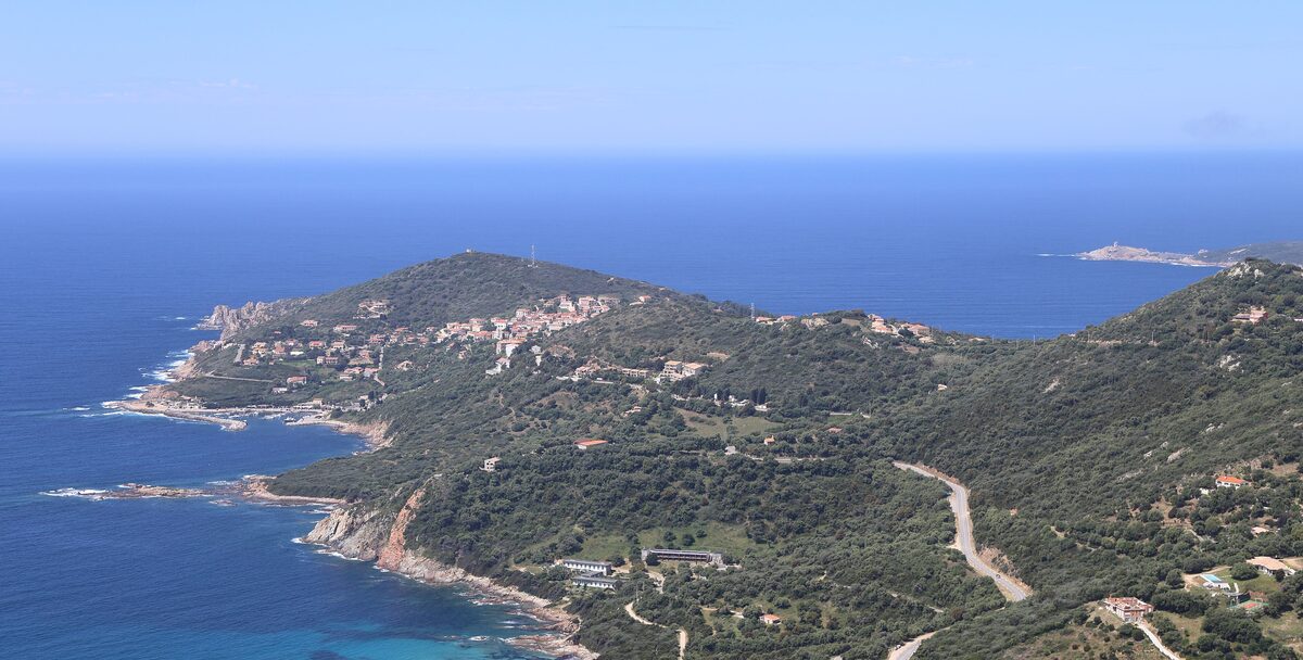 Cargèse on its headland, the village spread along the hillside above the blue sea