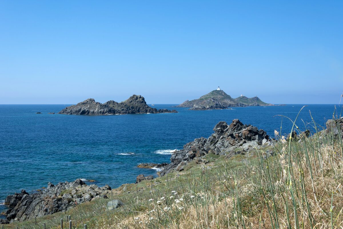 The Sanguinaire islands off the coast, with the lighthouse on the largest one, seen across the water