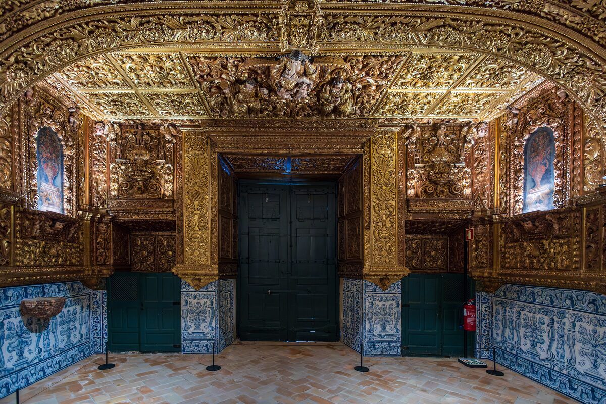 Gilded baroque interior of the Igreja de Santo António in Lagos, with blue azulejo tiles