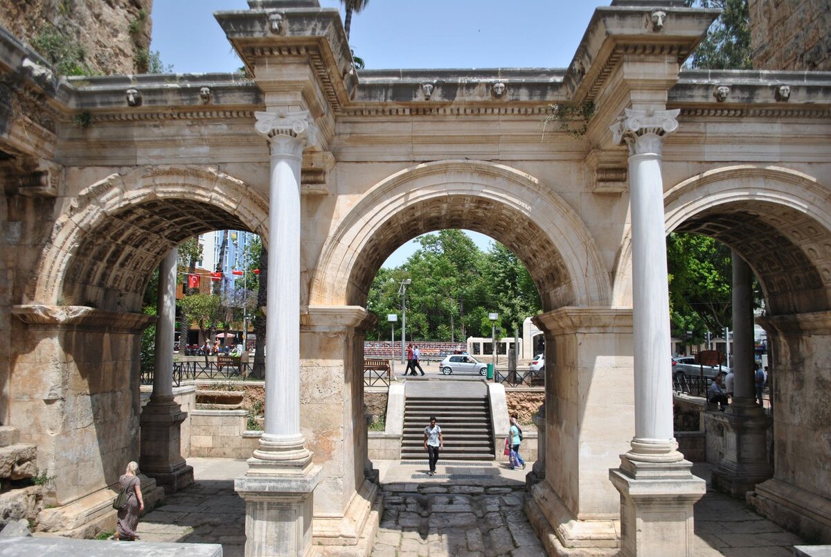The three marble arches and white columns of Hadrian's Gate