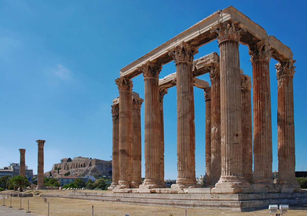 The surviving Corinthian columns of the Temple of Olympian Zeus, with the Acropolis in the distance