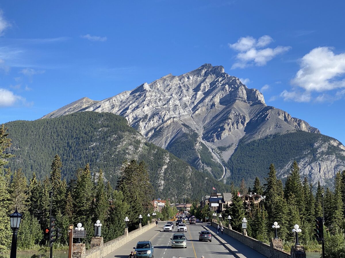Banff Avenue running toward Cascade Mountain on a clear summer day