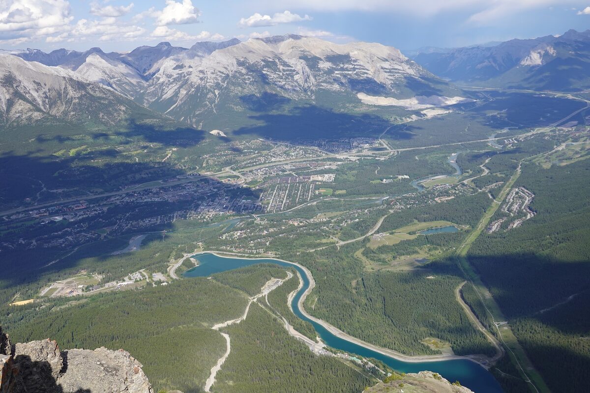 Canmore and the green Bow Valley seen from East End of Rundle