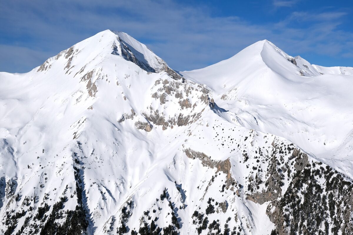 Snow-covered Vihren and Kutelo peaks of the Pirin Mountains seen from the Bansko ski centre