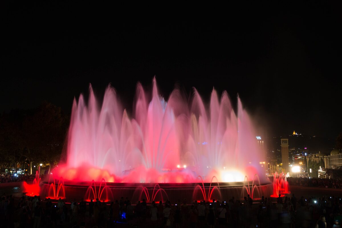 The Magic Fountain of Montjuïc with its jets lit pink at night