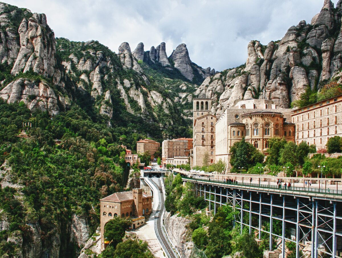 The rack railway track below the Montserrat monastery, with rock pinnacles above