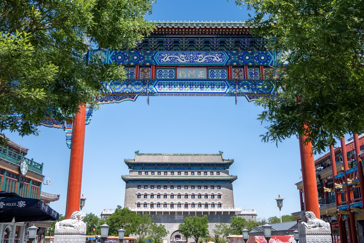The Zhengyangmen Arrow Tower seen through the painted archway at the south end of Qianmen Street