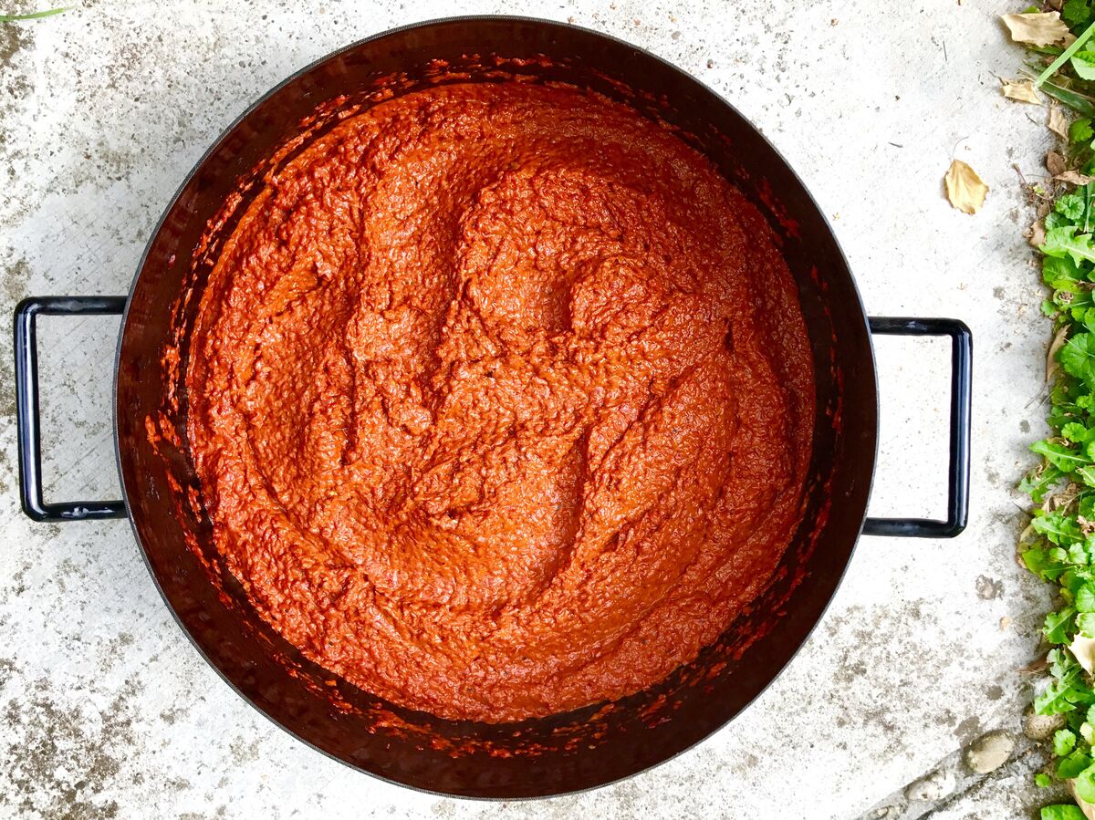 A pan of homemade ajvar, the roasted red pepper relish, seen from above