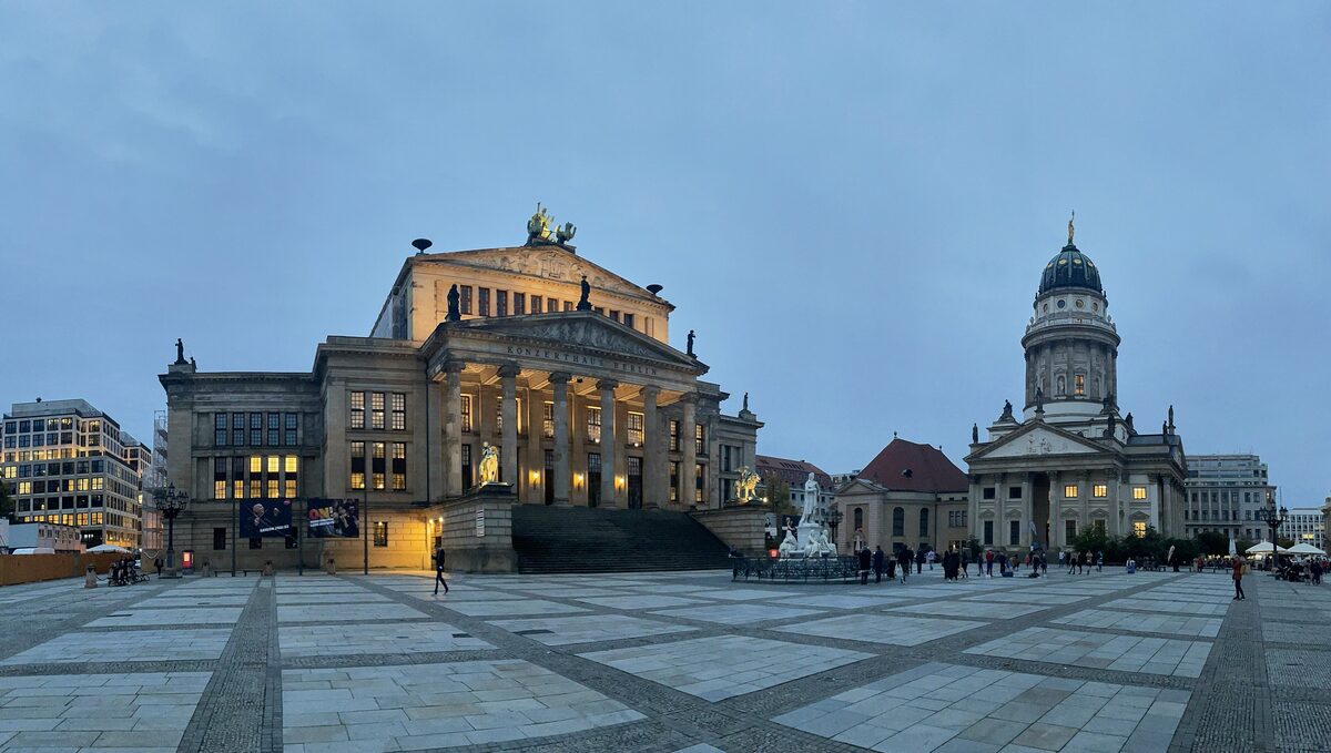 Gendarmenmarkt at dusk, with the Konzerthaus in the middle and the dome of the French Church on the right