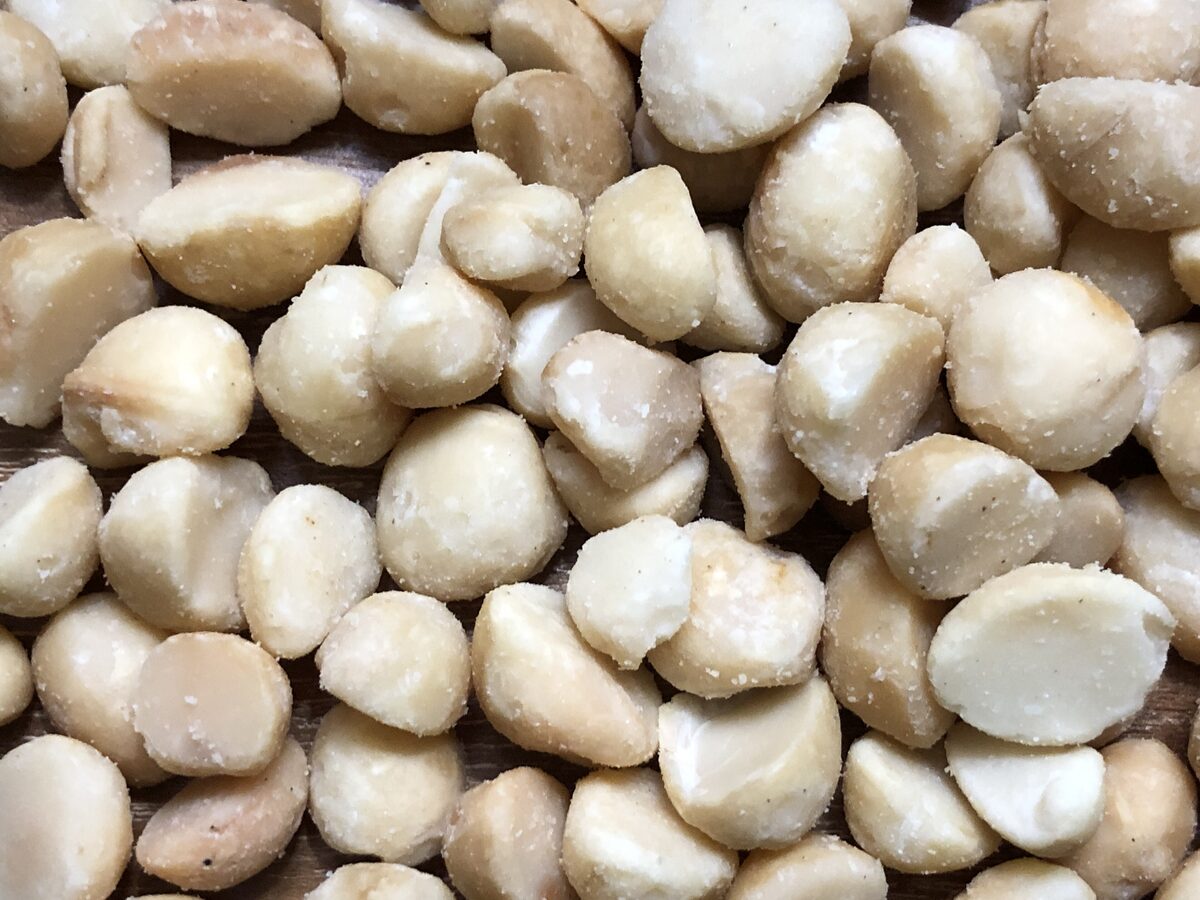 A pile of salted dry-roasted macadamia nuts