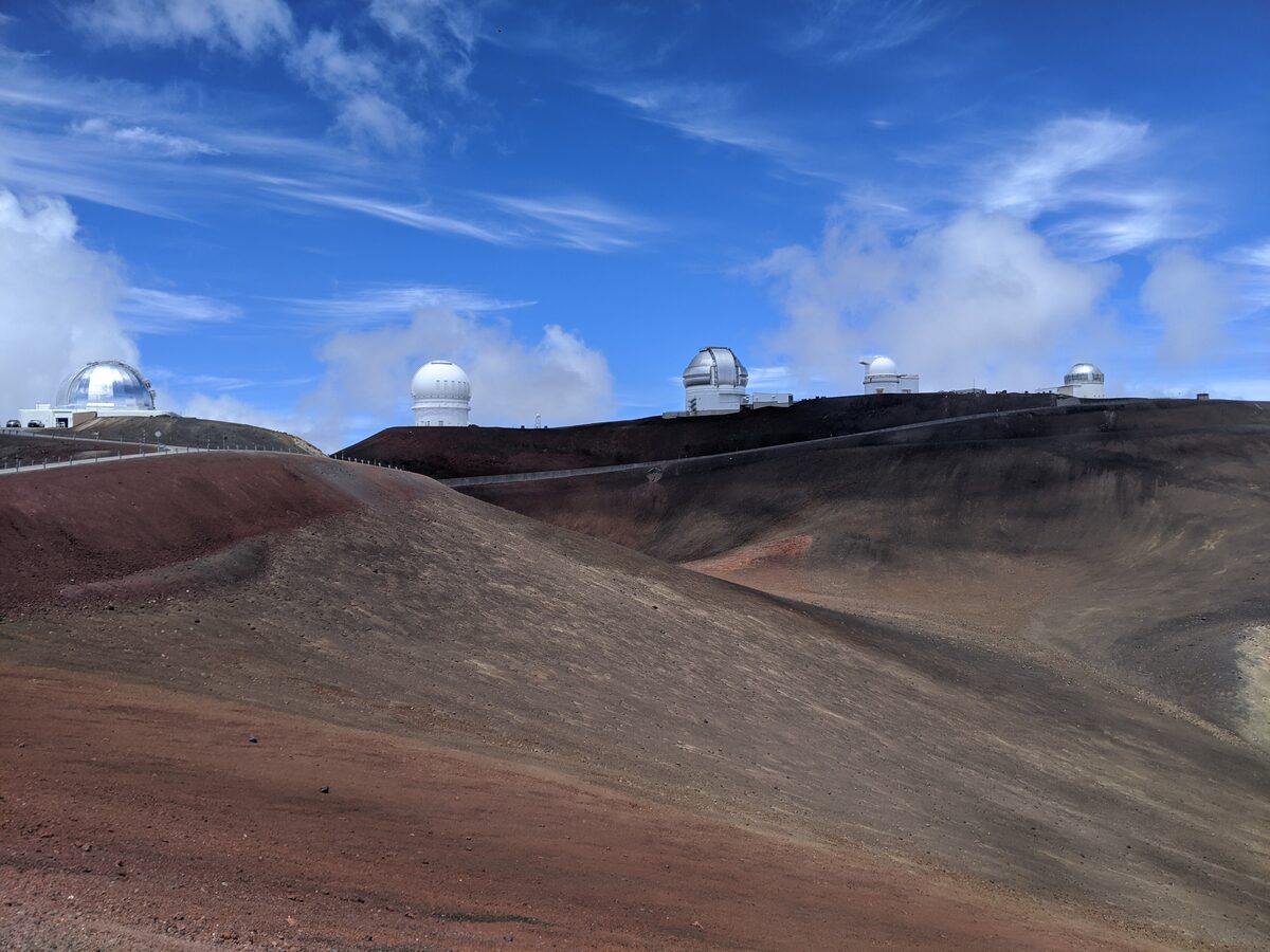 Observatory domes along the red cinder summit ridge of Mauna Kea