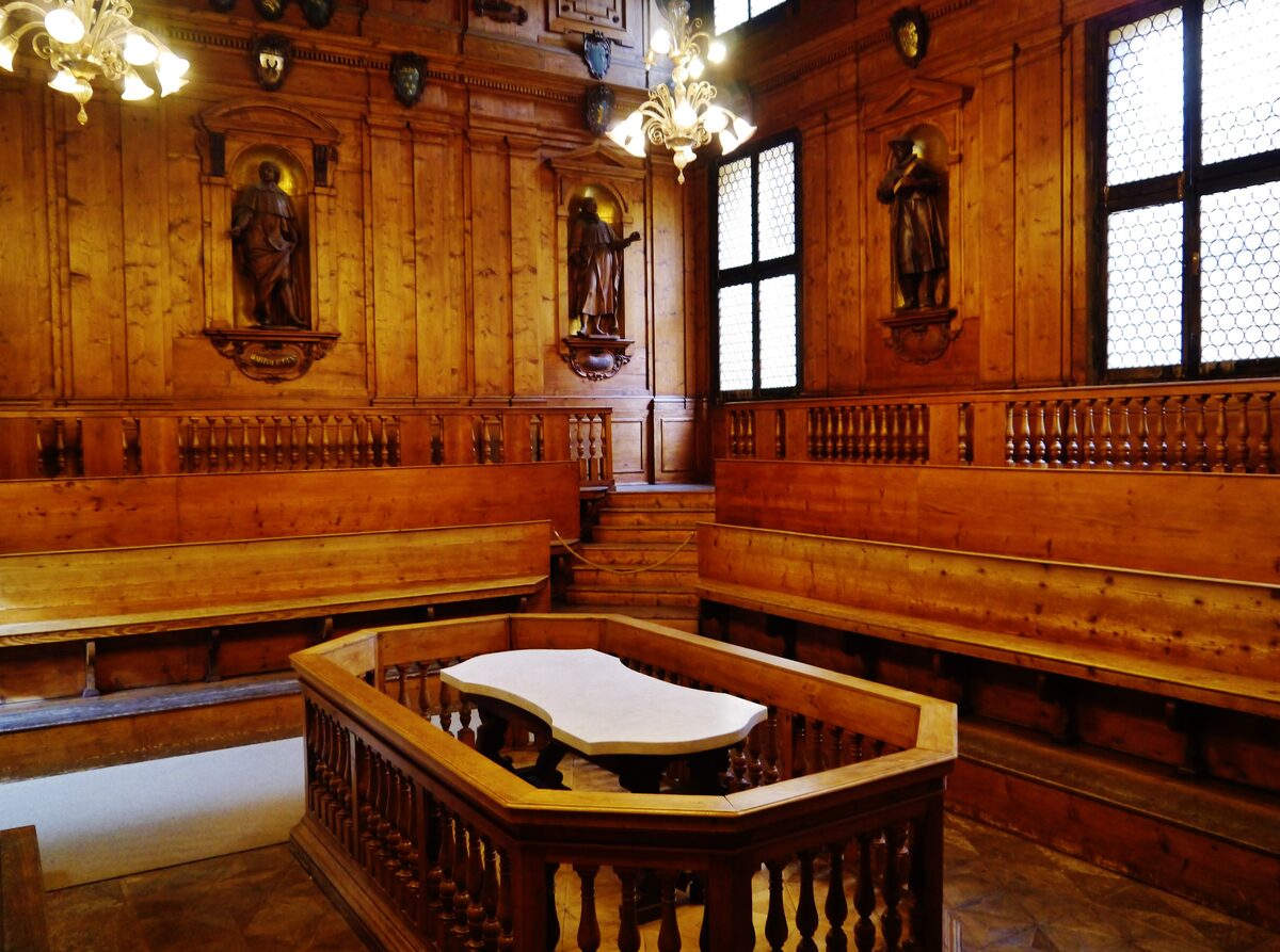 The fir-wood Anatomical Theatre, with the lecturer's table in the middle and carved statues on the walls